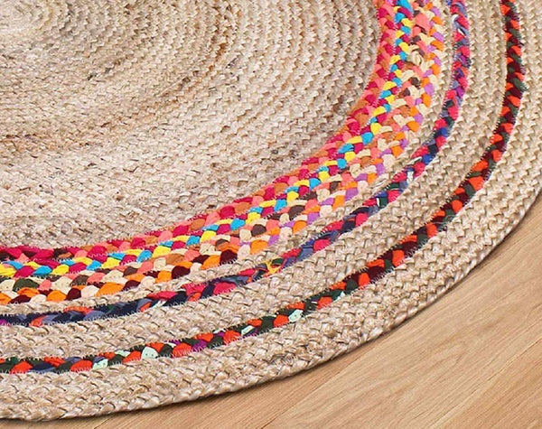 http://jaipurhandloom.com/cdn/shop/products/Jute-round-rug-circle-rugs_-Cotton-Carnivale-Braided-Round-Rug-5-Multi-Colored-Jaipur-Handloom-2_grande.jpg?v=1665048061